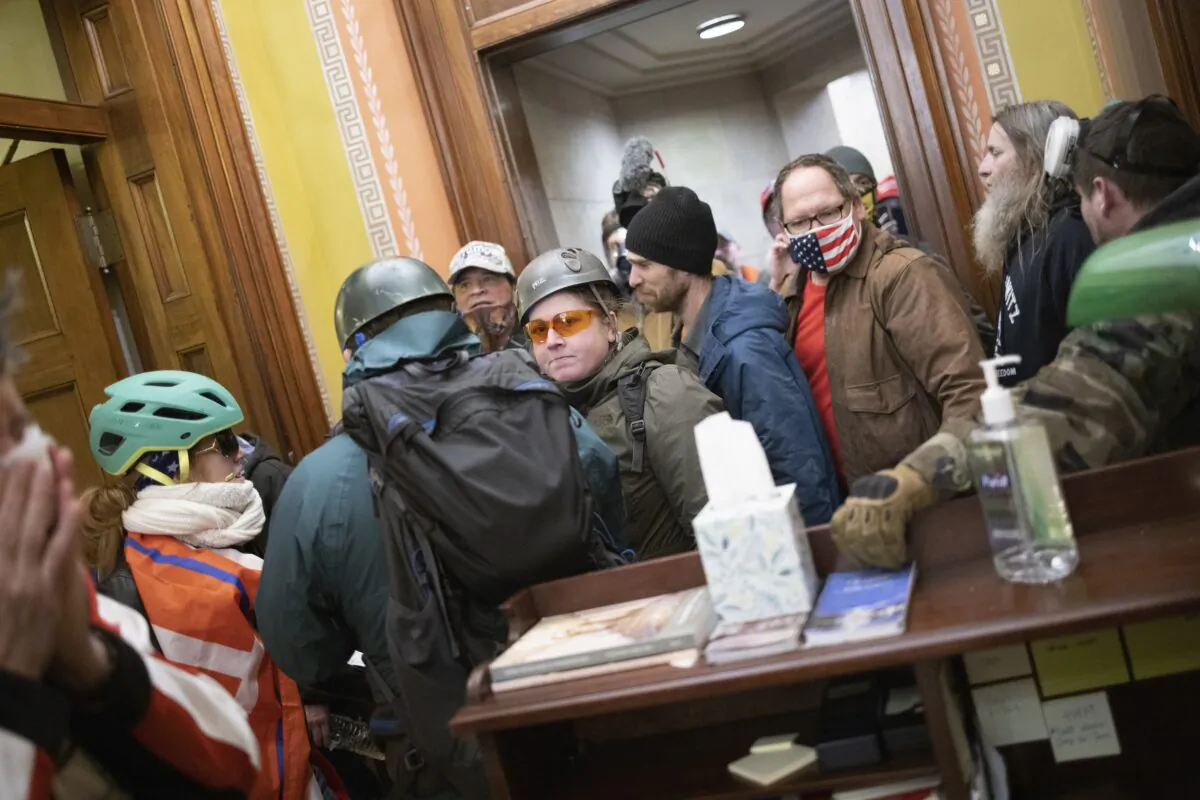 Protesters gather near the office of House Speaker Nancy Pelosi (D-Calif.) in Washington on Jan. 6, 2021. (Win McNamee/Getty Images)