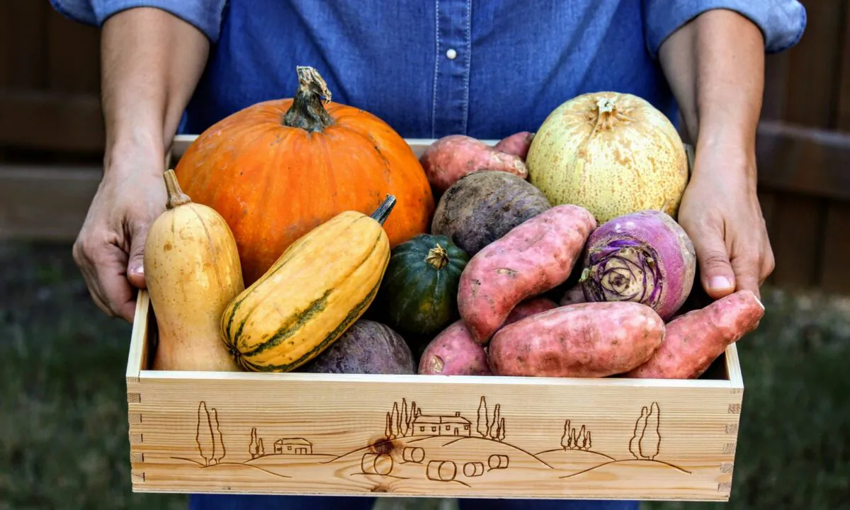 Buying locally grown produce, whether at a farmers market or through a CSA share, will help feed you well while supporting your community. (Jasmine Sahin/Shutterstock)