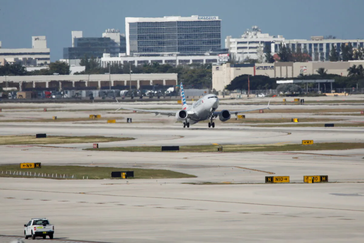 American Airlines flight 718, the first U.S. Boeing 737 MAX commercial flight since regulators lifted a 20-month grounding in November, takes off from Miami, Florida on Dec. 29, 2020. (Reuters/Marco Bello)