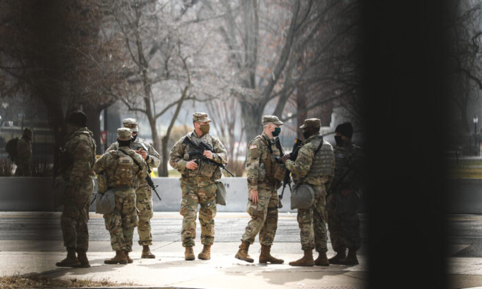 National Guard troops near the Capitol building in Washington on Jan. 15, 2021. (Charlotte Cuthbertson/The Epoch Times)