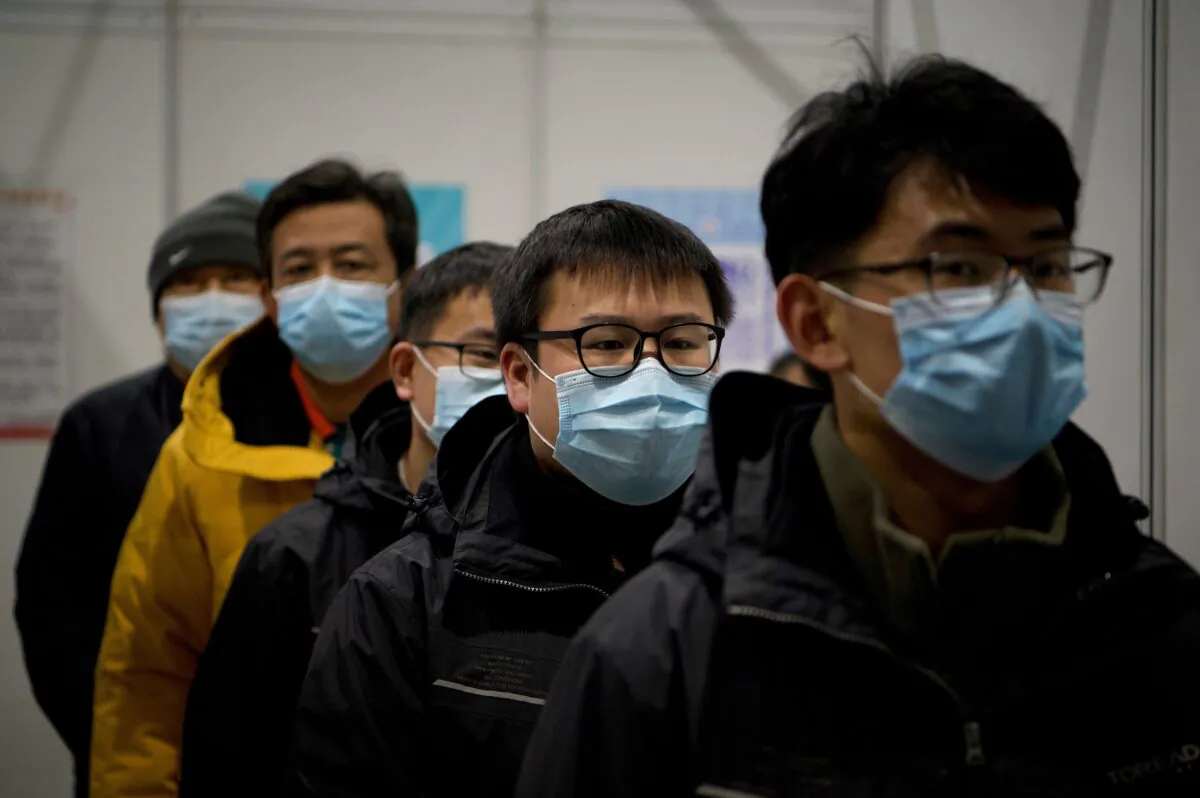 People arrive to be inoculated with a COVID-19 vaccine at the Chaoyang Museum of Urban Planning in Beijing, China on Jan. 15, 2021. (NOEL CELIS/AFP via Getty Images)