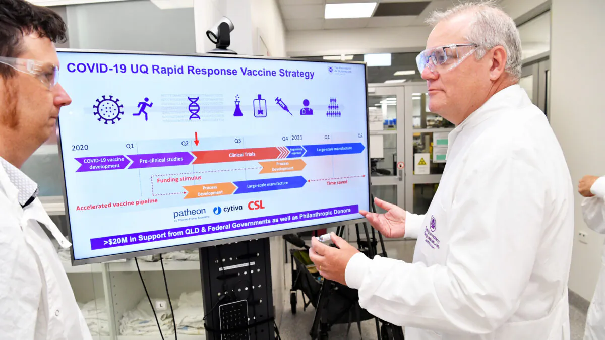 Scott Morrison touring the University of Queensland Vaccine Lab to look over their research as they try to develop a vaccine for the coronavirus on Oct. 12, 2020 in Brisbane, Australia. (Darren England/Getty Images)