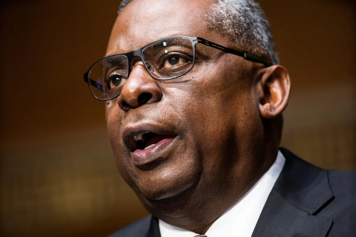 Retired General Lloyd Austin prepares to testify before the Senate Armed Services Committee during his confirmation hearing to be the next Secretary of Defense, in Washington, on Jan. 19, 2021. (Jim Lo Scalzo/Pool via REUTERS)
