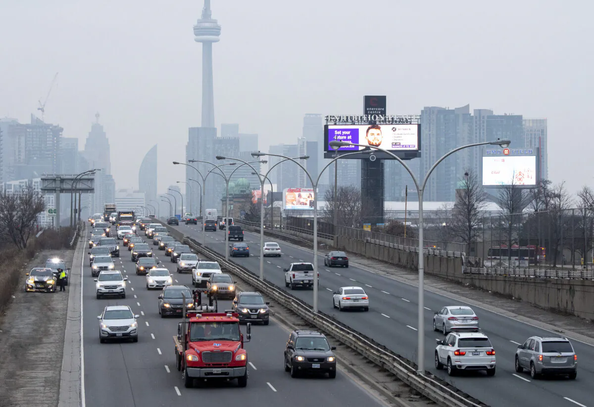 Heavy traffic leaves the downtown core in Toronto, Canada, on Jan. 14, 2021.(Frank Gunn/The Canadian Press)