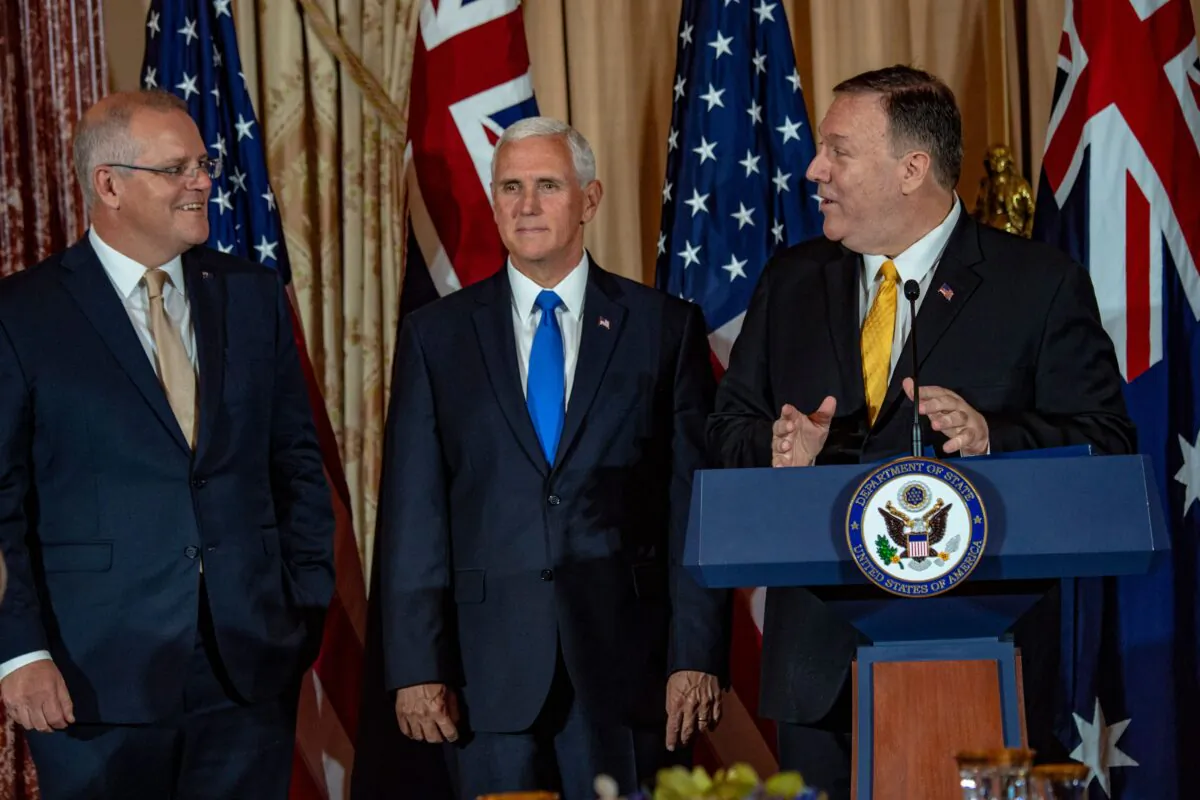 Australian Prime Minister Scott Morrison (L) listens to US Secretary of State Mike Pompeo (R) as US Vice President Mike Pence (C) looks on during a luncheon at the State Department in Washington, DC on September 20, 2019. ( ERIC BARADAT/AFP via Getty Images)