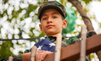 Flag-Carrying 11-Year-Old Takes Big Steps to Thank Law Enforcement