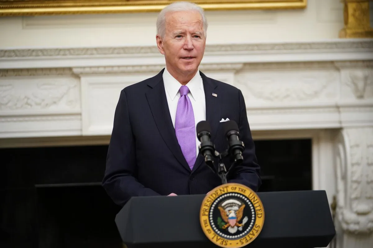 President Joe Biden speaks about the CCP virus response before signing executive orders in the State Dining Room of the White House in Washington, on Jan. 21, 2021. (Mandel Ngan/AFP via Getty Images)