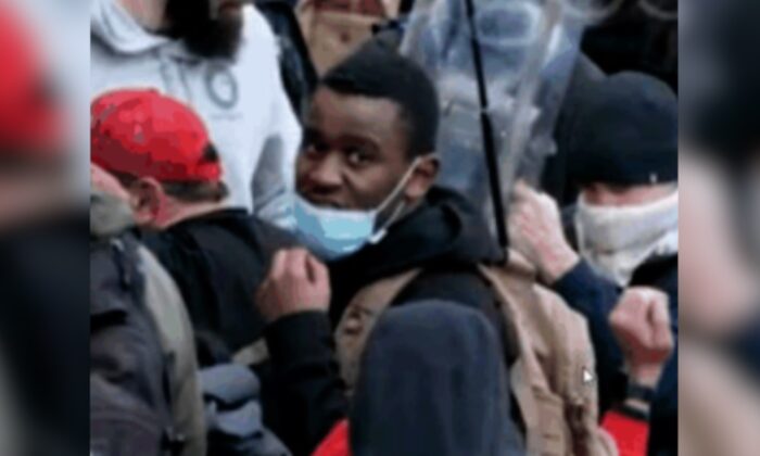 In this still image from video, a man identified as Emmanuel Jackson is seen outside the U.S. Capitol on Jan. 6, 2021. (FBI)