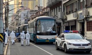 Residents in China’s Virus Hotspots Taken to Unknown Locations for Mass Quarantine