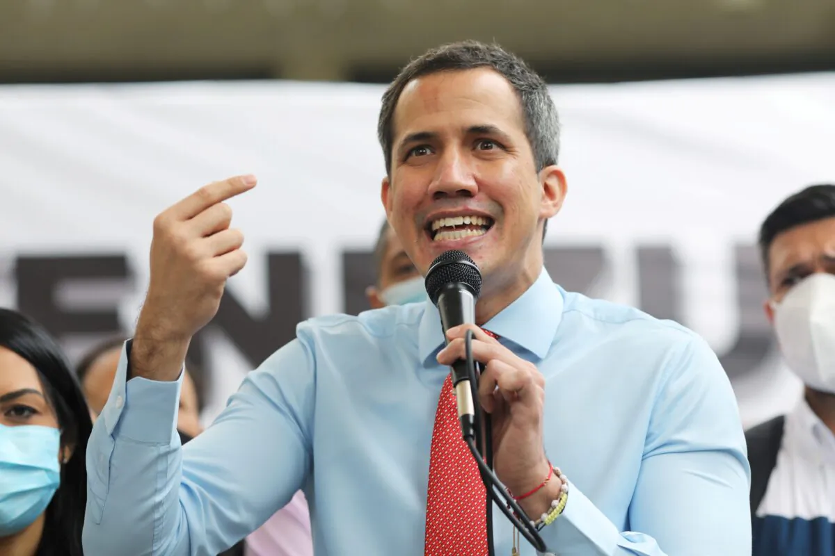 Opposition leader Juan Guaido speaks to the media during a news conference the day after the parliamentary election in Caracas, Venezuela on Dec. 7, 2020. (Manaure Quintero/Reuters)
