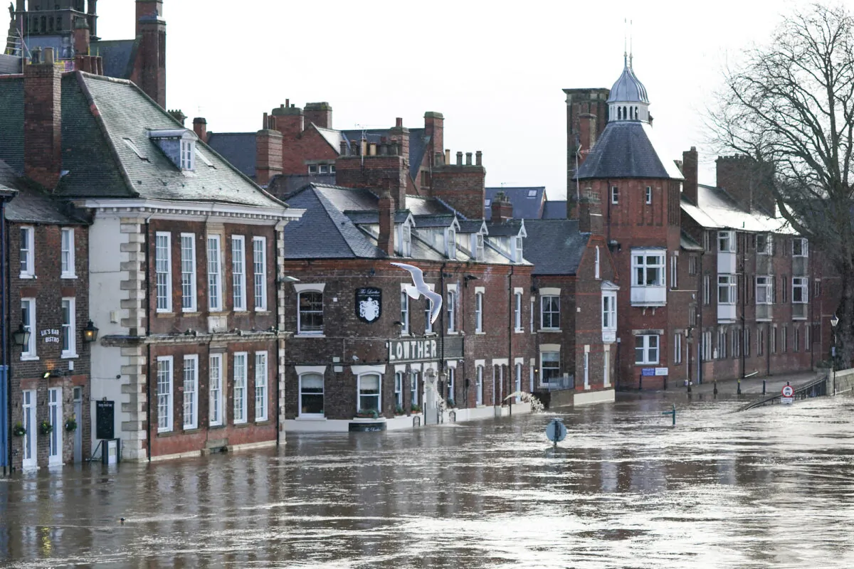 The River Ouse in York floods as rain and recent melting snow raise river levels in York, England on Jan. 21, 2021. (Ian Forsyth/Getty Images)