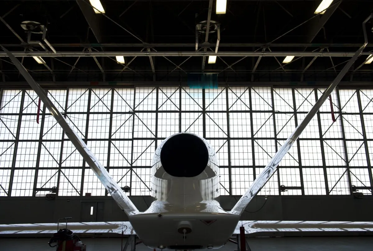A NASA Global Hawk unmanned aerial vehicle, or drone aircraft, is stored inside an airplane hangar during a Hurricane and Severe Storm Sentinel, or HS3, mission at NASA's Wallops Flight Facility in Wallops Island, Va., on Sept. 10, 2013. (Saul Loeb/AFP via Getty Images)