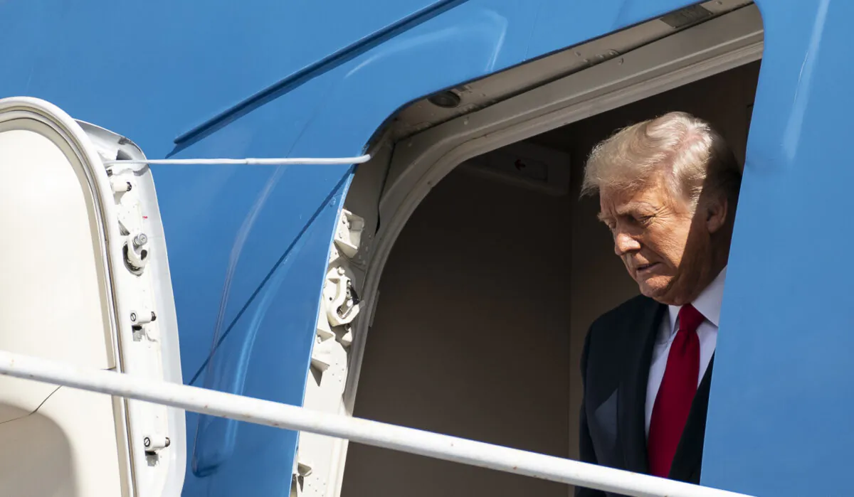 Former President Donald Trump steps off Air Force One as he arrives at Palm Beach International Airport in West Palm Beach, Fla., on Jan. 20, 2021. (Alex Edelman/AFP via Getty Images)