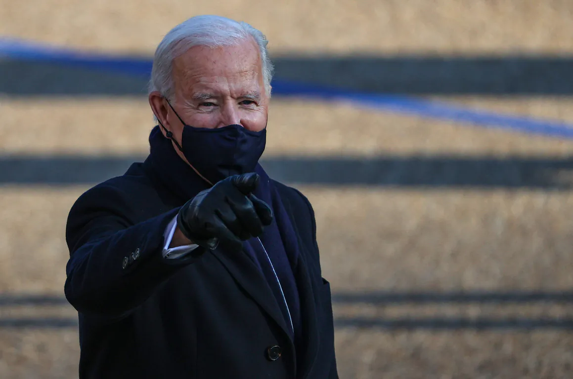 President Joe Biden walks the abbreviated parade route after Biden's inauguration on January 20, 2021 in Washington. (Patrick Smith/Getty Images)