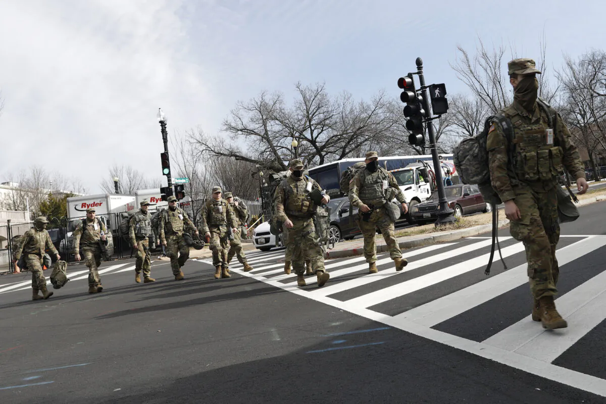 National Guard troops around the U.S. Capitol, in Washington on Jan. 21, 2021. (Rebecca Blackwell/AP Photo)