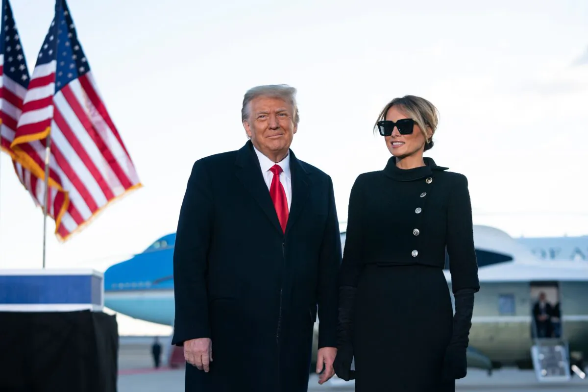 Outgoing President Donald Trump and First Lady Melania Trump address guests at Joint Base Andrews in Maryland on January 20, 2021. (Alex Edelman/AFP via Getty Images)
