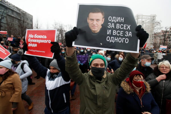 Navalny supporter holding a placard