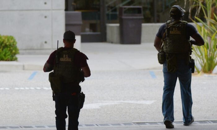 U.S. Marshals are pictured in a file photo taken in Santa Monica, Calif., on June 7, 2013. (Joe Klamar/AFP via Getty Images)