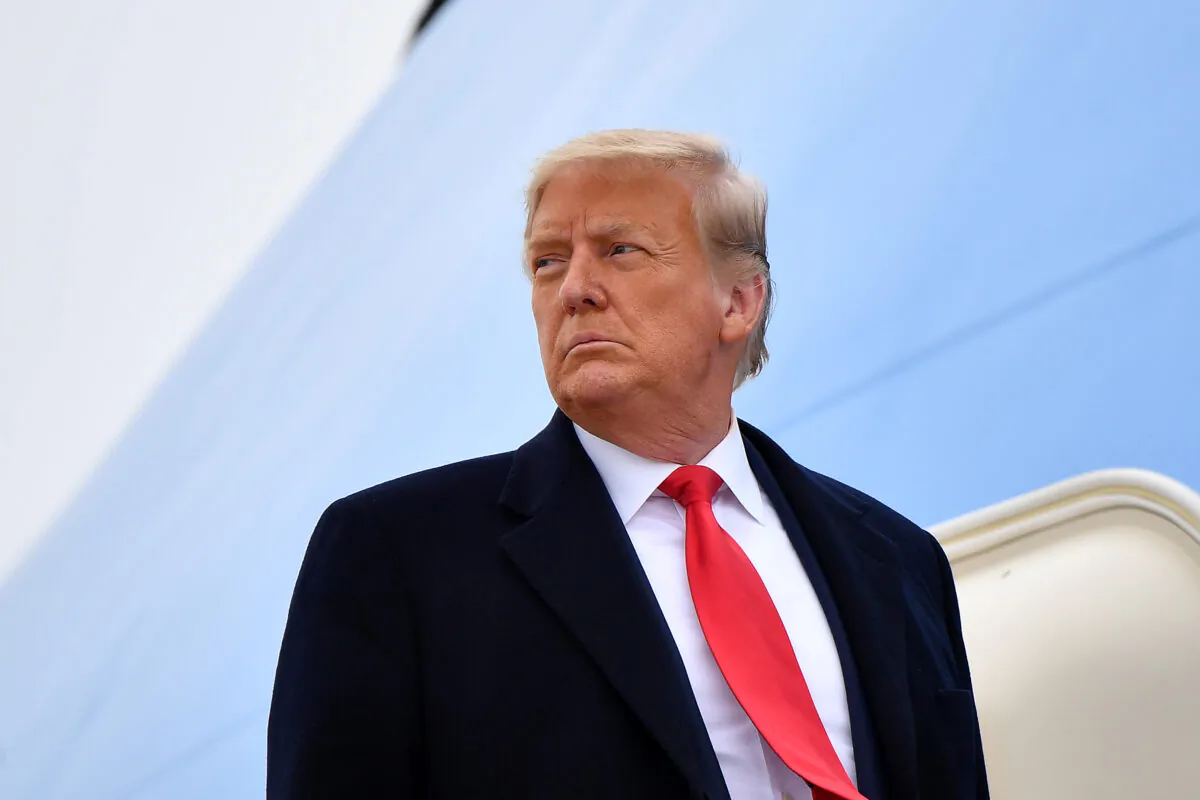 Then-President Donald Trump boards Air Force One before departing Harlingen, Texas, on Jan. 12, 2021. (Mandel Ngan/AFP via Getty Images)