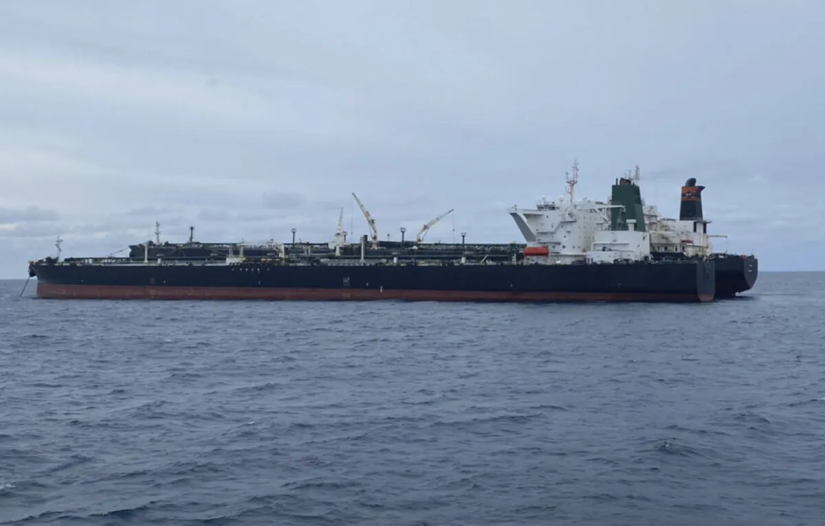 Iranian-flagged MT Horse and Panamanian-flagged MT Frea, rear, tankers are seen anchored together in Pontianak waters off Borneo island, Indonesia, on Jan. 24, 2021. (Indonesian Maritime Security Agency via AP)