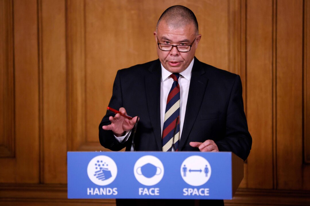 Jonathan Van-Tam, England’s deputy chief medical officer, speaks during a virtual press conference inside 10 Downing Street, in central London, on Dec. 2, 2020. (John Sibley/Pool/AFP via Getty Images)