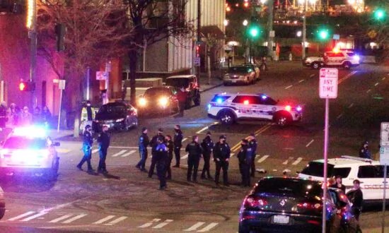 Officer Under Investigation After Police Car Hits Pedestrians at Street Race Incident, 2 Injured