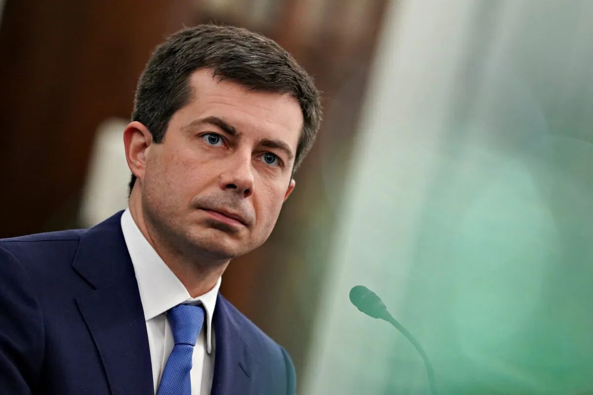 Pete Buttigieg, the secretary of transportation nominee for President Joe Biden, listens during a Senate confirmation hearing in Washington on Jan. 21, 2021. (Stefani Reynolds/Pool via Reuters)