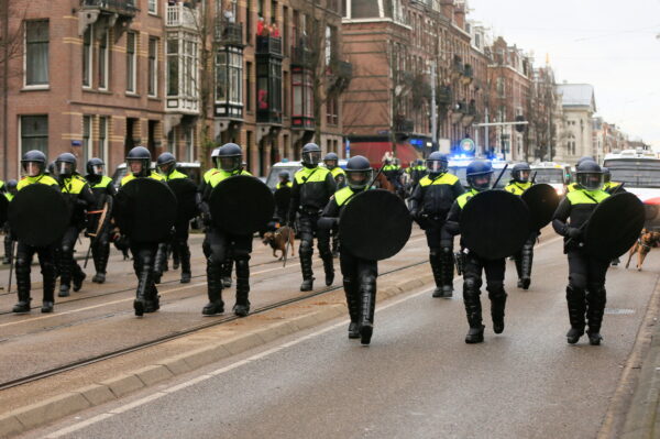 Police officer walk on a street