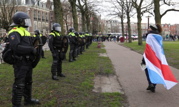 Police officers line up during a protest