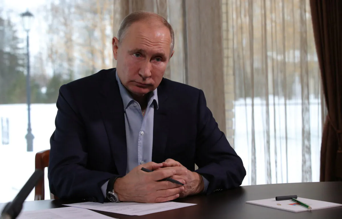 Russian President Vladimir Putin attends a meeting with university students via a video conference call at a state residence in Zavidovo, Russia, on Jan. 25, 2021. (Sputnik/Mikhail Klimentyev/Kremlin via Reuters)