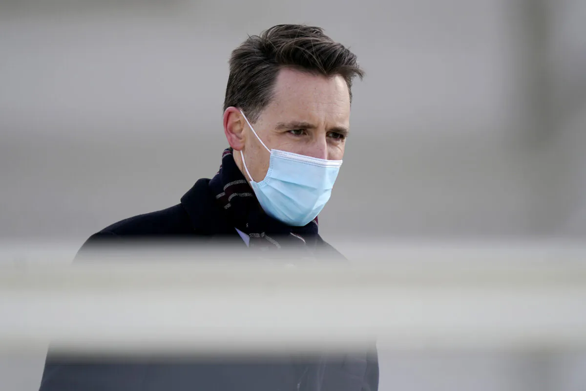 Sen. Josh Hawley (R-Mo.) arrives at the inauguration of President-elect Joe Biden at the U.S. Capitol in Washington on Jan. 20, 2021. (Drew Angerer/Getty Images)