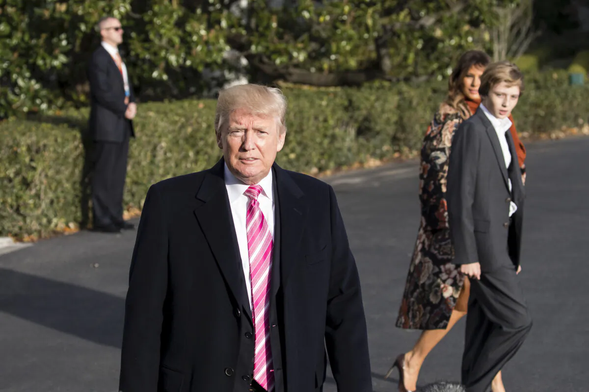 President Donald Trump talks to reporters before departing with his family from the White House to his Mar-a-Lago resort in Florida for the Thanksgiving holiday, in Washington on Nov. 21, 2017. (Samira Bouaou/The Epoch Times)