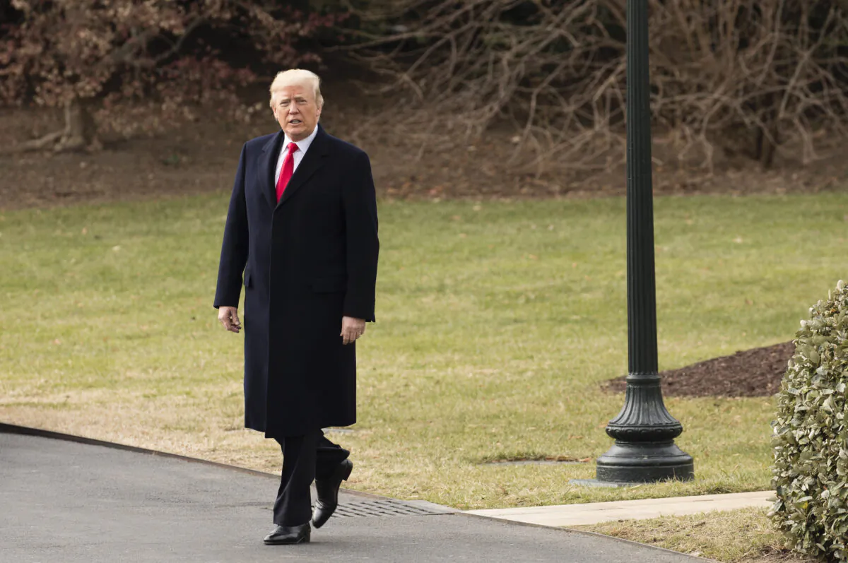 President Donald Trump departs the White House en route to Florida after signing the Tax Cut and Reform Bill in the Oval Office in Washington, on Dec. 22, 2017. (Samira Bouaou/The Epoch Times)