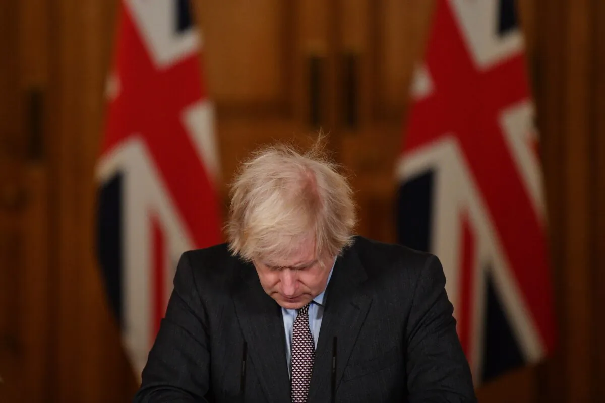 Prime Minister Boris Johnson speaks during a virtual press conference on the COVID-19 pandemic, at Downing Street in London, on Jan. 26, 2021. (Justin Tallis - WPA Pool/Getty Images)