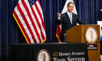 Spitzer Blasts Lawsuit Against DNA Database Program