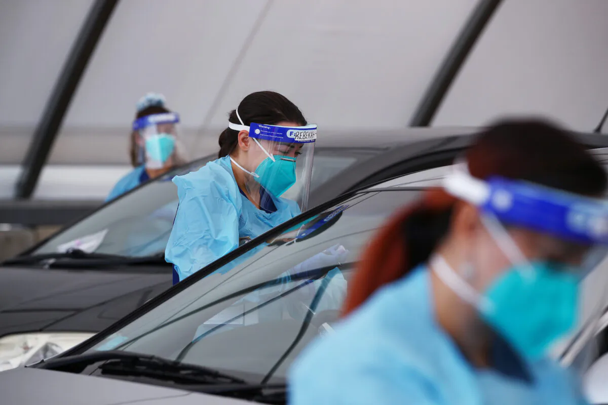 Nurses are seen conducting COVID-19 tests at the Bondi Beach testing clinic in Sydney, Australia on Nov. 4, 2020. (Lisa Maree Williams/Getty Images)