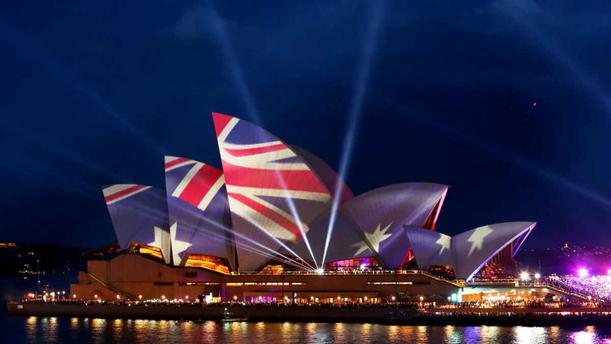 The Australian flag projected on the sails of the Sydney Opera House in Sydney, Australia, on Jan. 26, 2020. (Don Arnold/Getty Images)