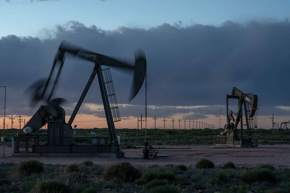 Pump jacks operate at dusk near Loco Hills in Eddy County, N.M., on April 23, 2020. (Paul Ratje/AFP via Getty Images)