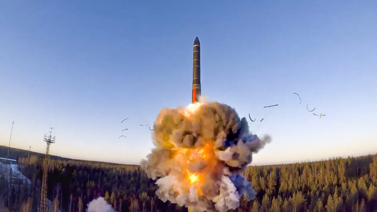 A rocket launches from a missile system as part of a ground-based intercontinental ballistic missile test at the Plesetsk facility in northwestern Russia on Dec. 9, 2020. (Russian Defense Ministry Press Service via AP)