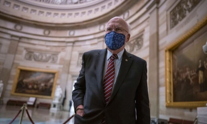 Sen. Patrick Leahy (D-Vt.) the president pro tempore of the Senate, pauses in the Rotunda of the Capitol awaiting the article of impeachment against former President Donald Trump, in Washington, on Jan. 25, 2021. (J. Scott Applewhite/POOL/AFP via Getty Images)