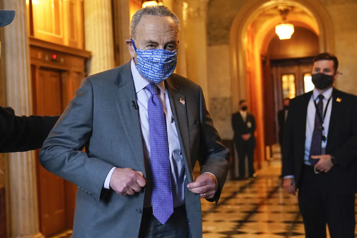 Senate Majority Leader Chuck Schumer of N.Y., heads to an interview on Capitol Hill in Washington, Jan. 25, 2021. (Susan Walsh/AP Photo)