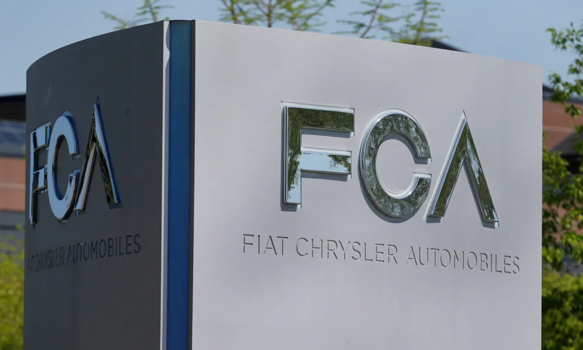 A Fiat Chrysler Automobiles (FCA) sign is at the U.S. headquarters in Auburn Hills, Mich., on May 25, 2018. (Rebecca Cook/Reuters)