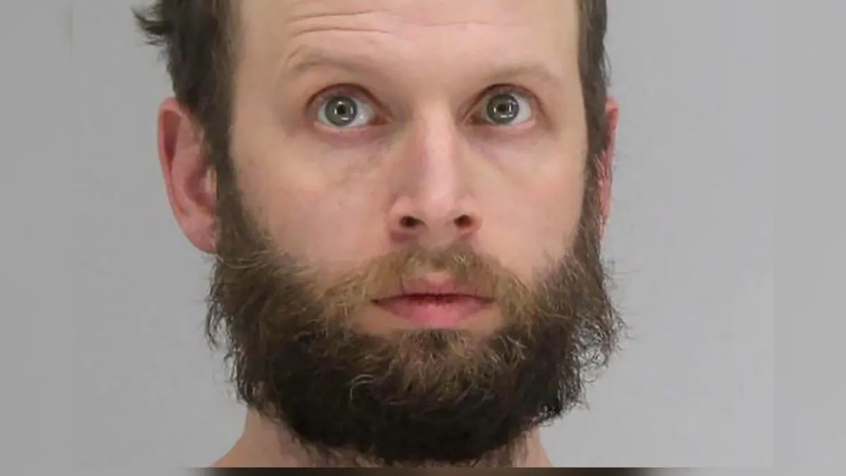 Garret Miller, who was arrested on federal charges relating to the January 6, 2021 U.S. Capitol occupation, poses in an undated booking photograph in Dallas, Texas. (Dallas County Sheriff's Department/Handout via Reuters)