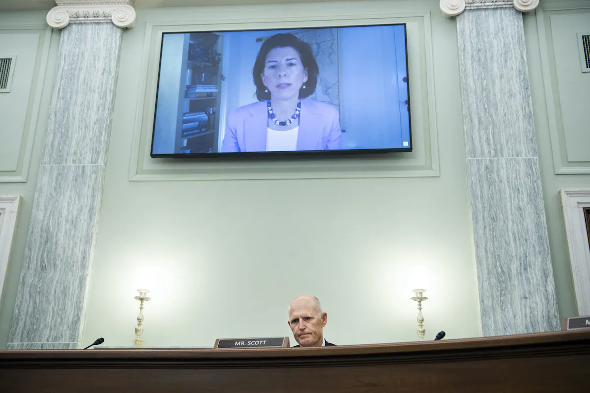 Sen. Rick Scott (R-Fla.) questions Gina Raimondo, nominee for secretary of commerce, during her Senate Commerce, Science, and Transportation Committee confirmation hearing in Washington on Jan. 26, 2021. (Tom Williams/CQ Roll Call/POOL)