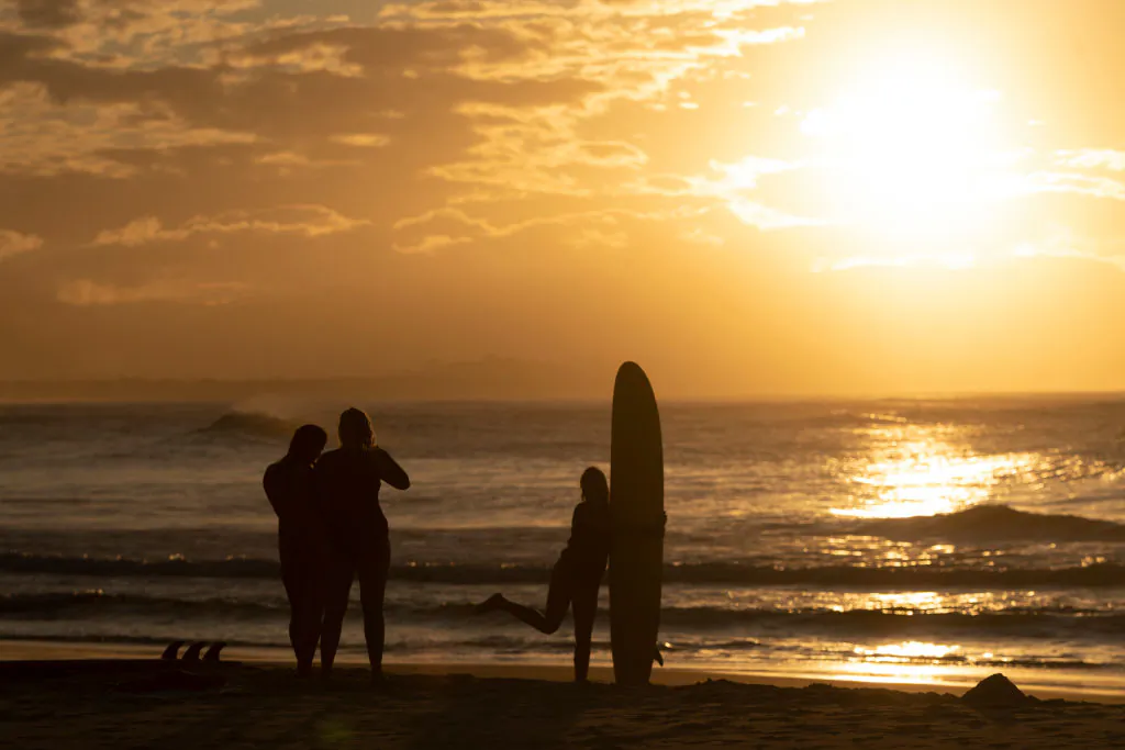 People take a photo during sunset on June 11, 2020 in Byron Bay, Australia. (Brook Mitchell/Getty Images)