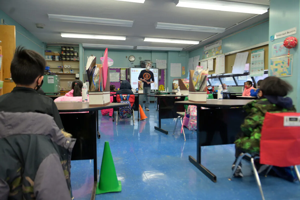 A view of a teacher and students at Yung Wing School P.S. 124 in New York City on Jan. 13, 2021. (Michael Loccisano/Getty Images)