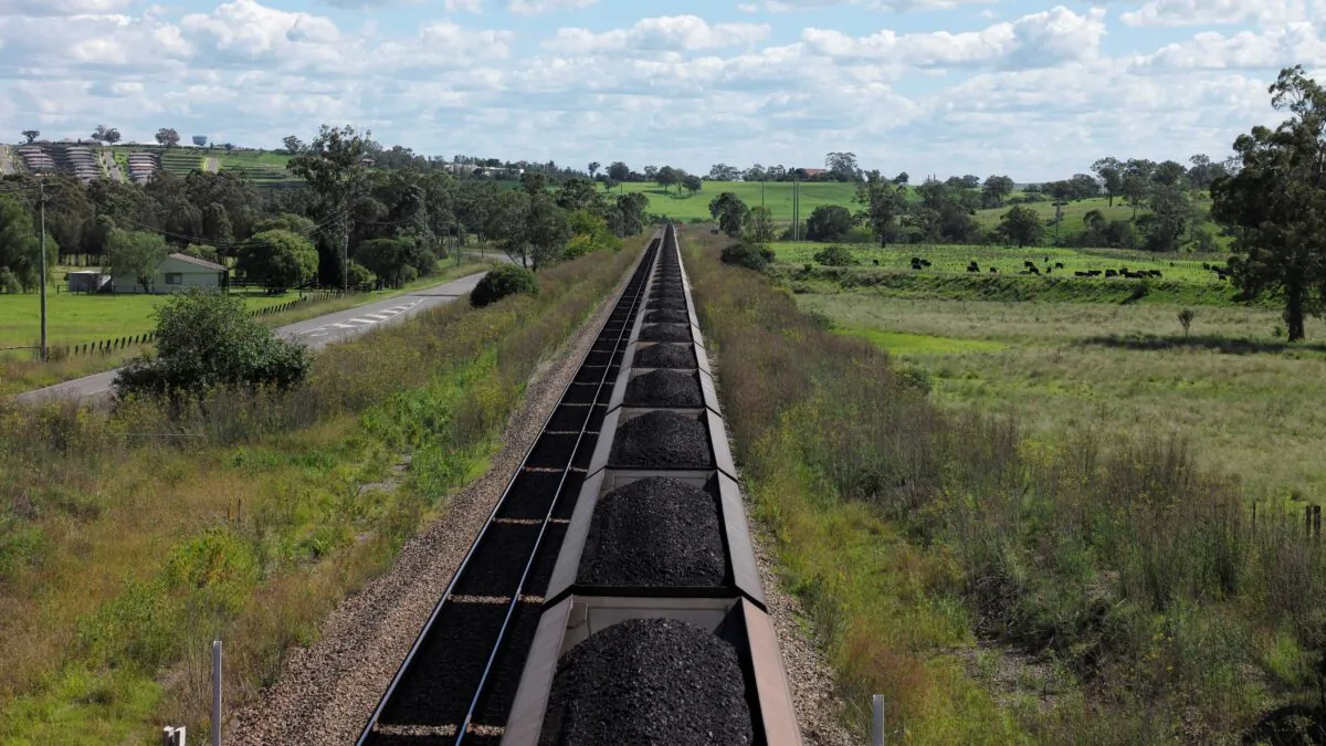 An Aurizon coal train travels through the countryside in Muswellbrook, Australia, on April 9, 2017. (Jason Reed/Reuters)