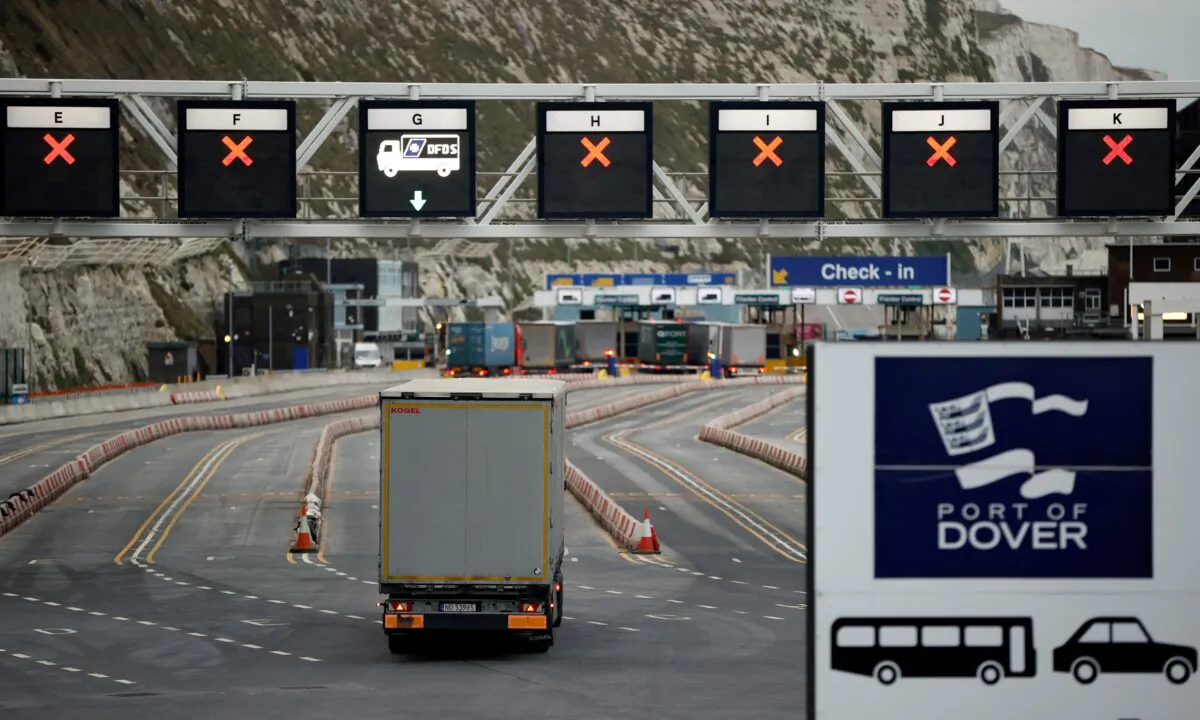 A truck drives toward the entrance to the Port of Dover, following the end of the Brexit transition period, in Dover, England, on Jan. 15, 2021. (John Sibley/Reuters)