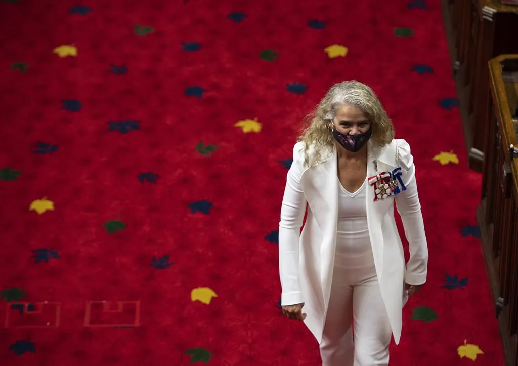 Gov.Gen Julie Payette walks in the chamber after greeting Senators before delivering the Speech from the Throne, at the Senate of Canada Building in Ottawa, on Sept. 23, 2020. (Justin Tang/The Canadian Press)