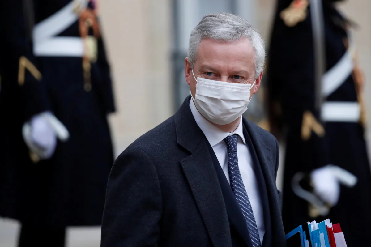French Economy and Finance Minister Bruno Le Maire, wearing a protective face mask, leaves following the weekly cabinet meeting at the Elysee Palace in Paris, France on Jan. 27, 2021. (Gonzalo Fuentes/Reuters)